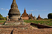 The cluster of red brick temples, named Khay-min-gha on the map on the North plain of Bagan. Myanmar. 